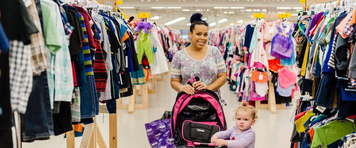 women shopping with child at JBF event